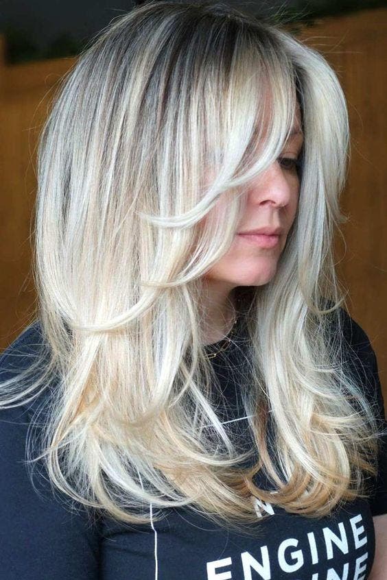 Cabelo comprido loiro platinado em camadas