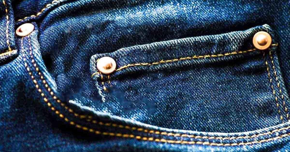 À quoi servent les petits boutons sur les poches des jeans ?