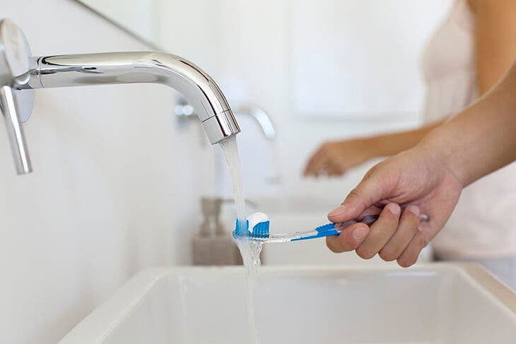Toothbrush under the tap