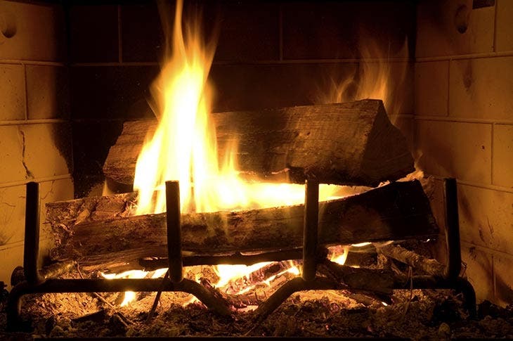 burning wood in a fireplace