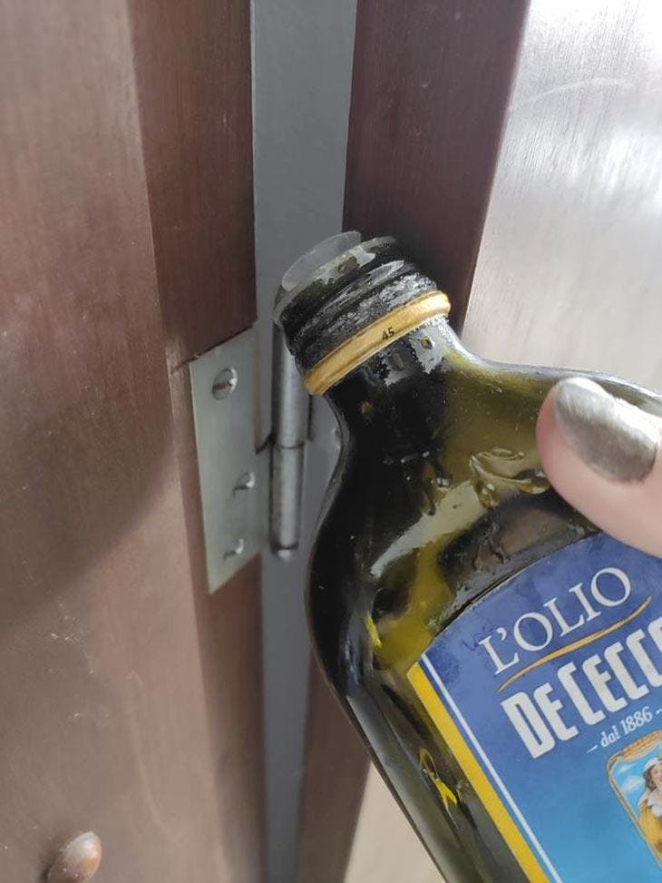 Oil against a creaky door
