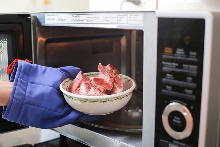 Defrost meat in the microwave.