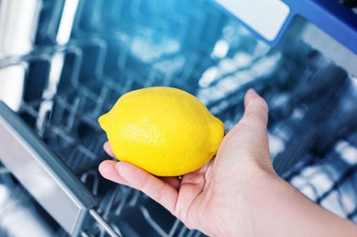 Deodorize a dishwasher with lemon