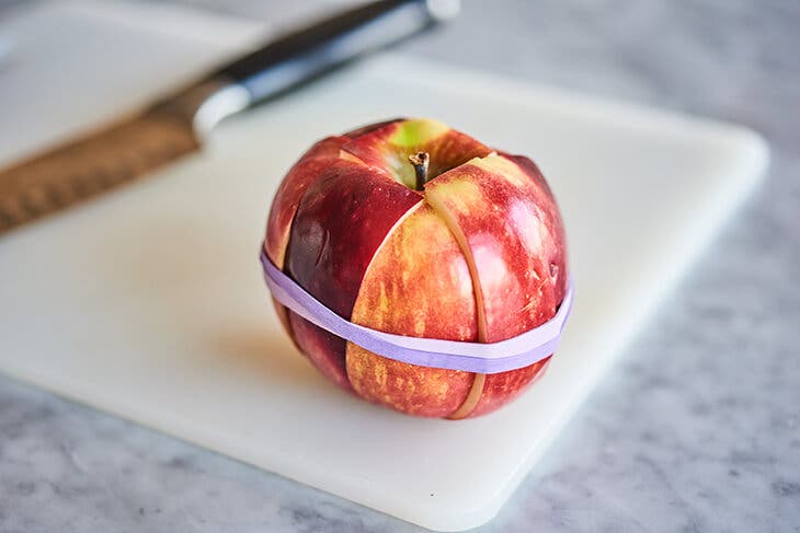 rubber band on an apple