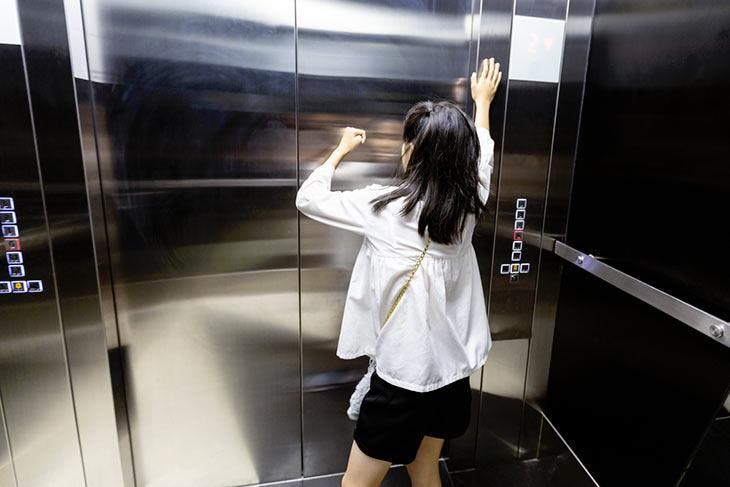 Woman trapped in an elevator