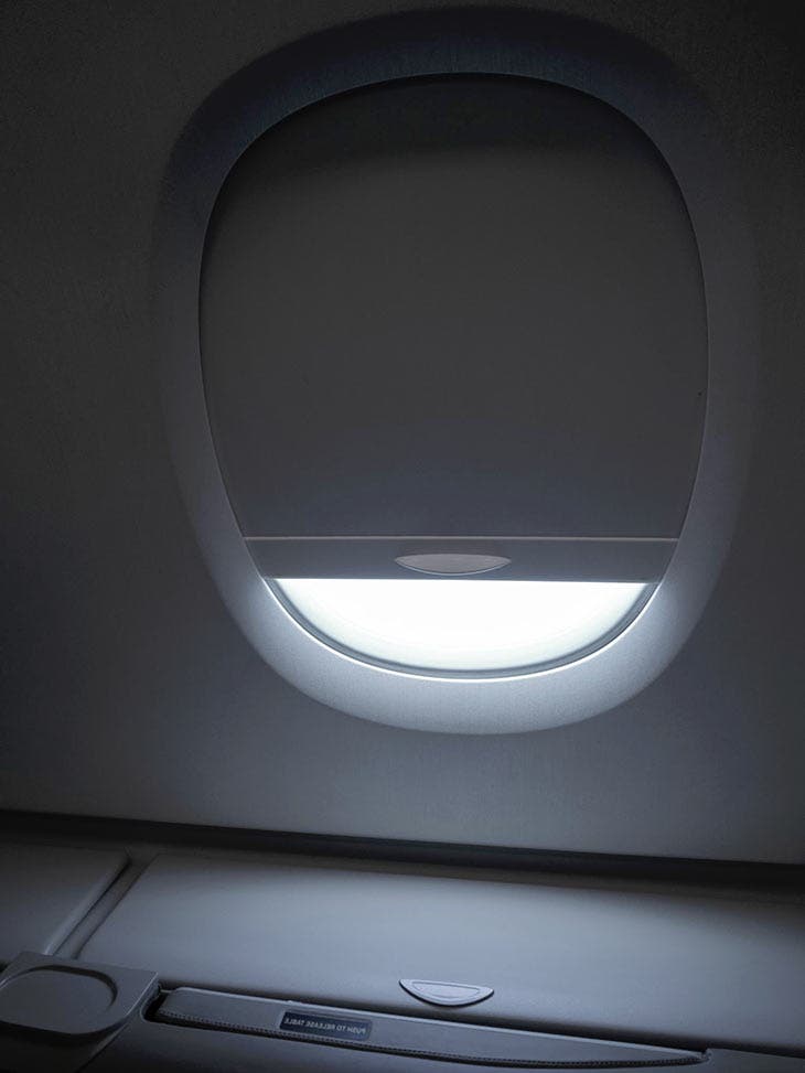 Close the shutters of the plane window