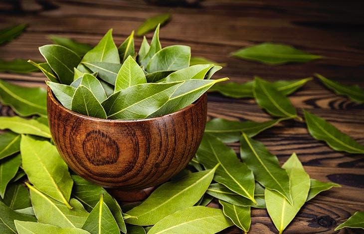Bay leaves in a wooden bowl