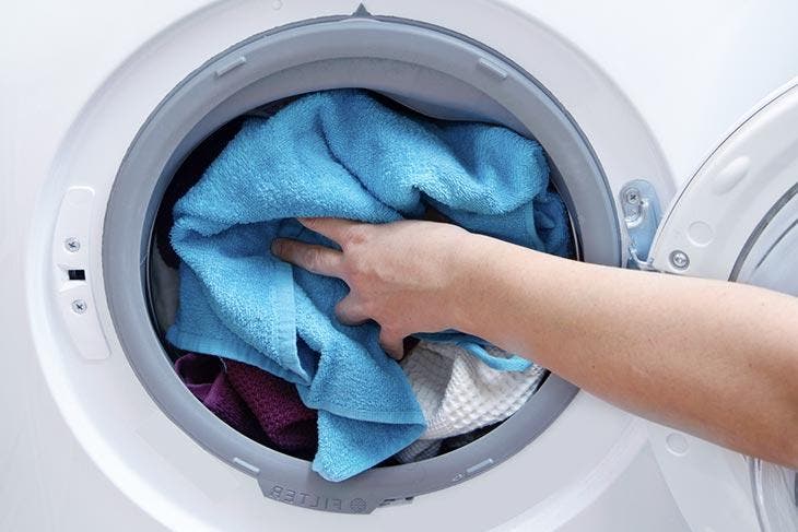 Wash clothes in the washing machine