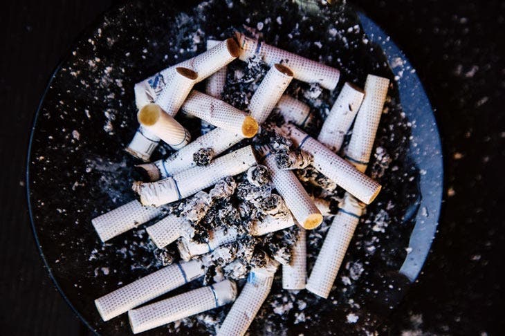Cigarette butts in ashtray