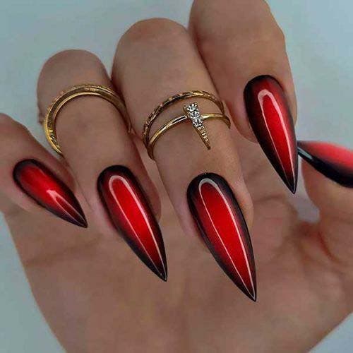 Unhas de estilete sexy vermelhas e pretas