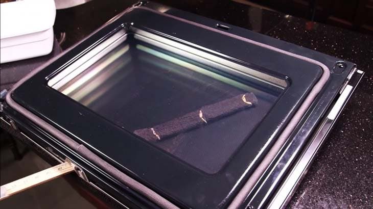 Tool inside the double glass of the oven