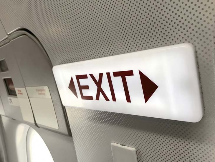 Exit sign inside an airplane