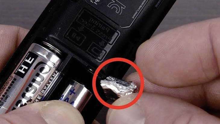 Put aluminum foil in the remote control battery compartment