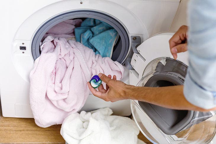 Put the detergent capsule in the washing machine