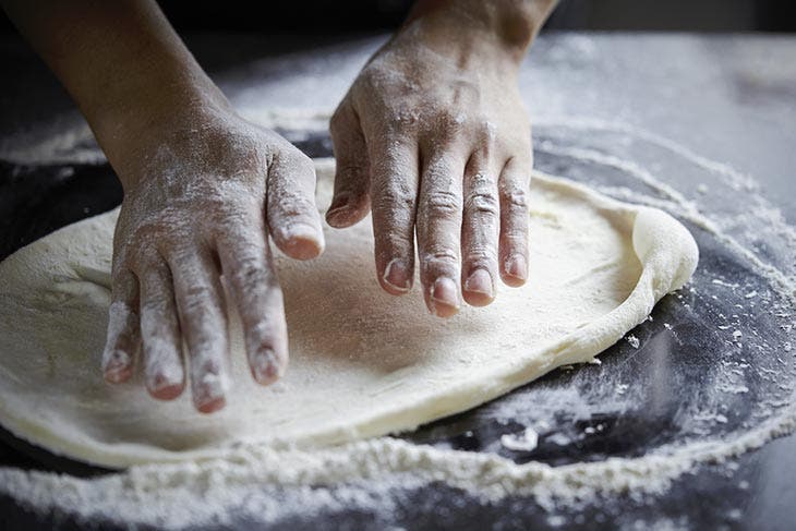 Preparing the pizza dough