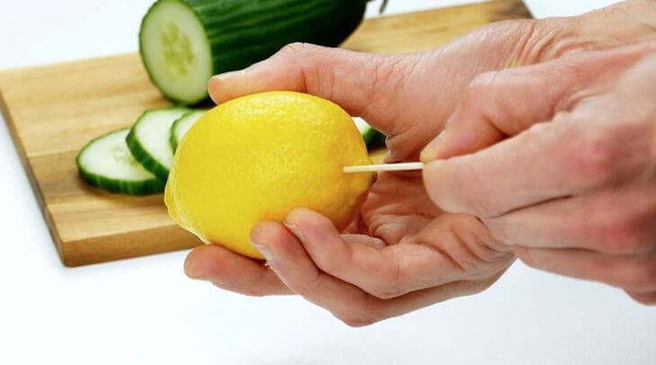 Squeeze a lemon using a toothpick