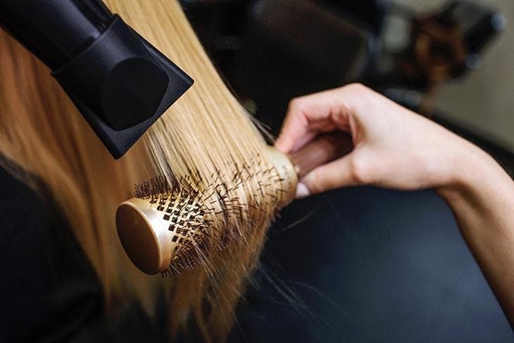 Comb your hair with a hair dryer