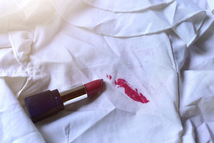 Lipstick spot on white linen