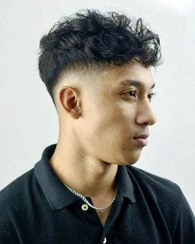 Taper avec boucles mi-longues Taper avec boucles mi-longues