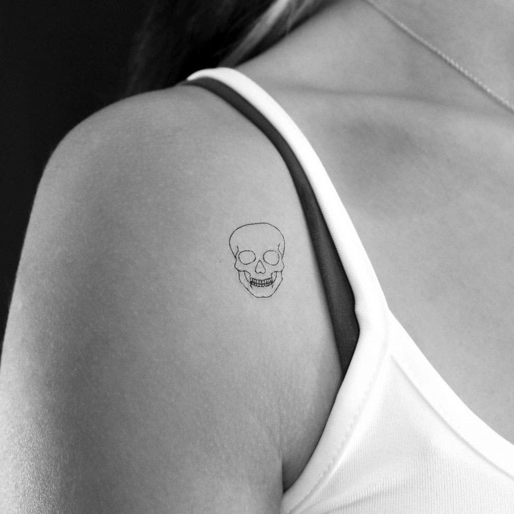 Tatouage tête de mort minimaliste Tatouage tête de mort minimaliste