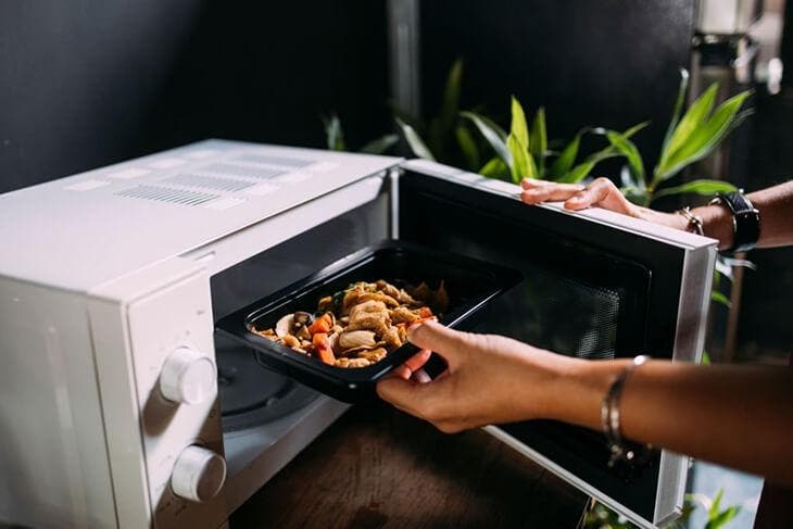 Using the microwave to reheat a dish
