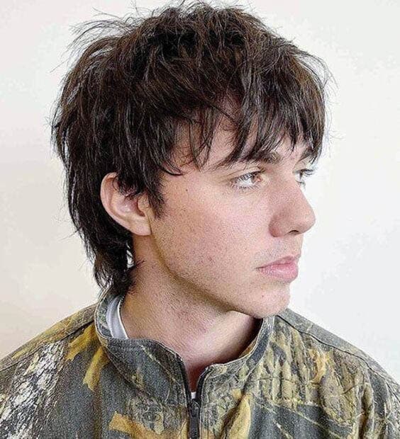 Wolf cut avec frange texturée Wolf cut avec frange texturée
