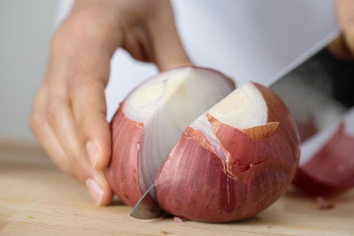 Cut the onion in half